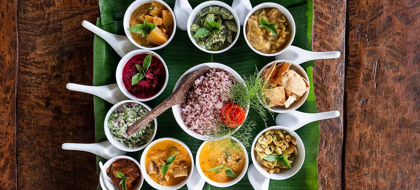 A Sri Lankan rice and curry spread served on a banana leaf at the estate restaurant