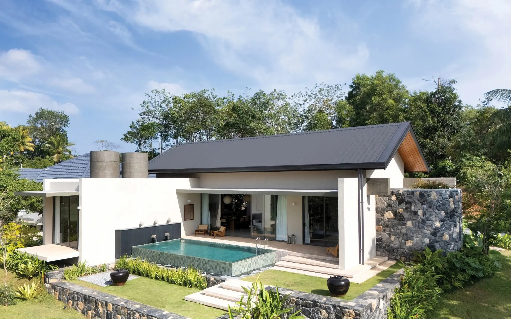 Exterior, pool and garden at Hansa Villa