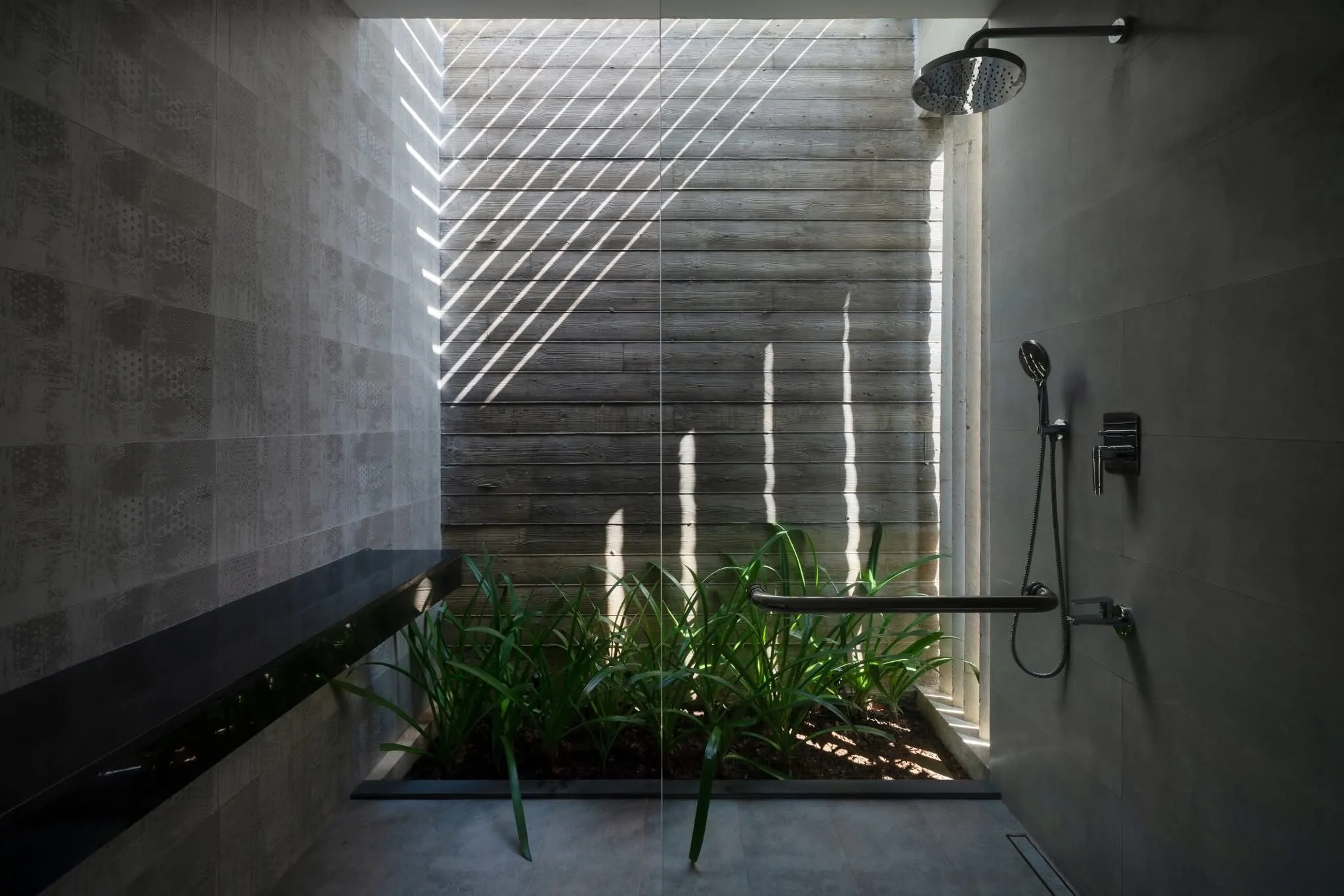 Garden bathroom with rain shower at Hansa Villa