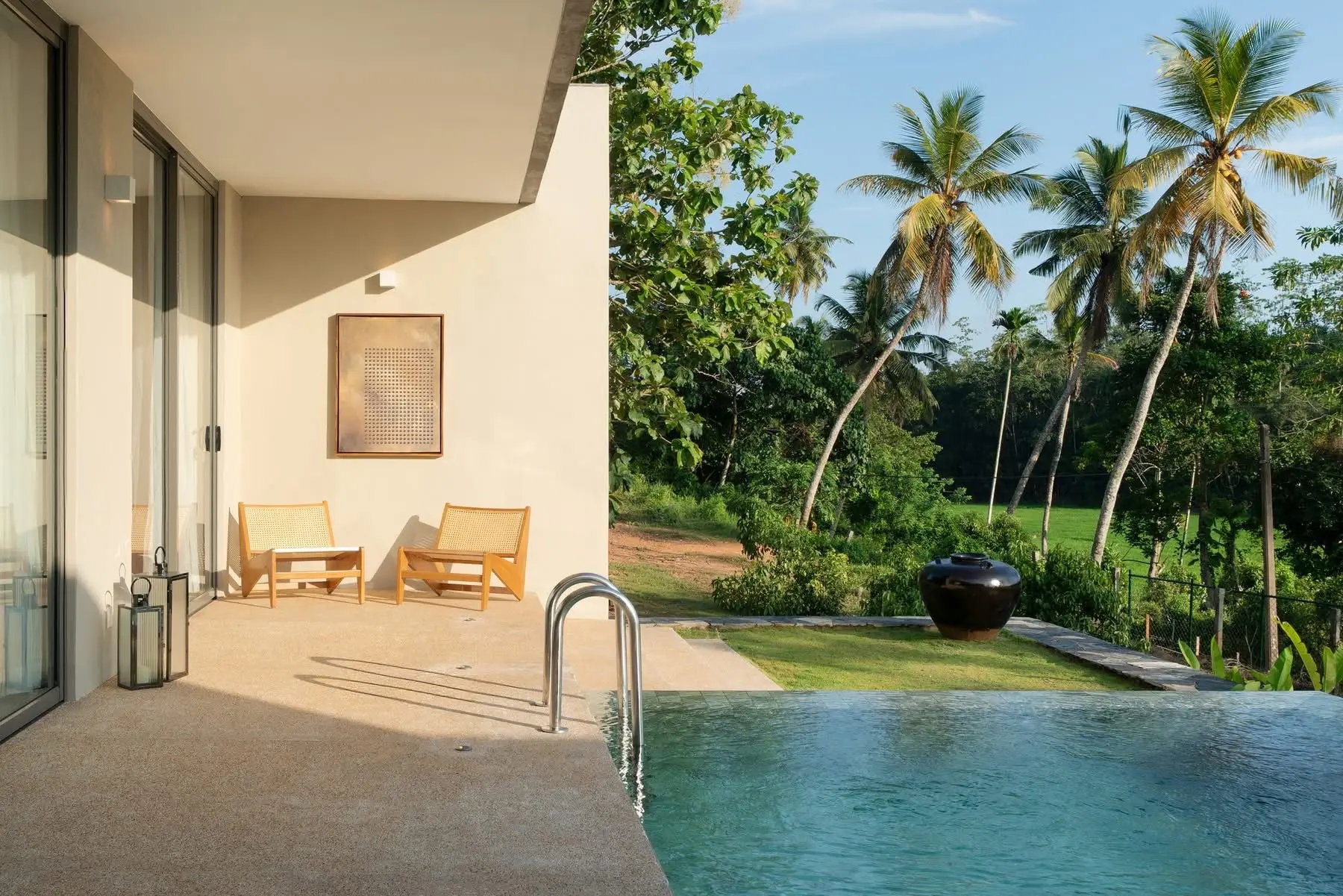 The infinity pool at Hansa Villa looking out over the paddy fields
