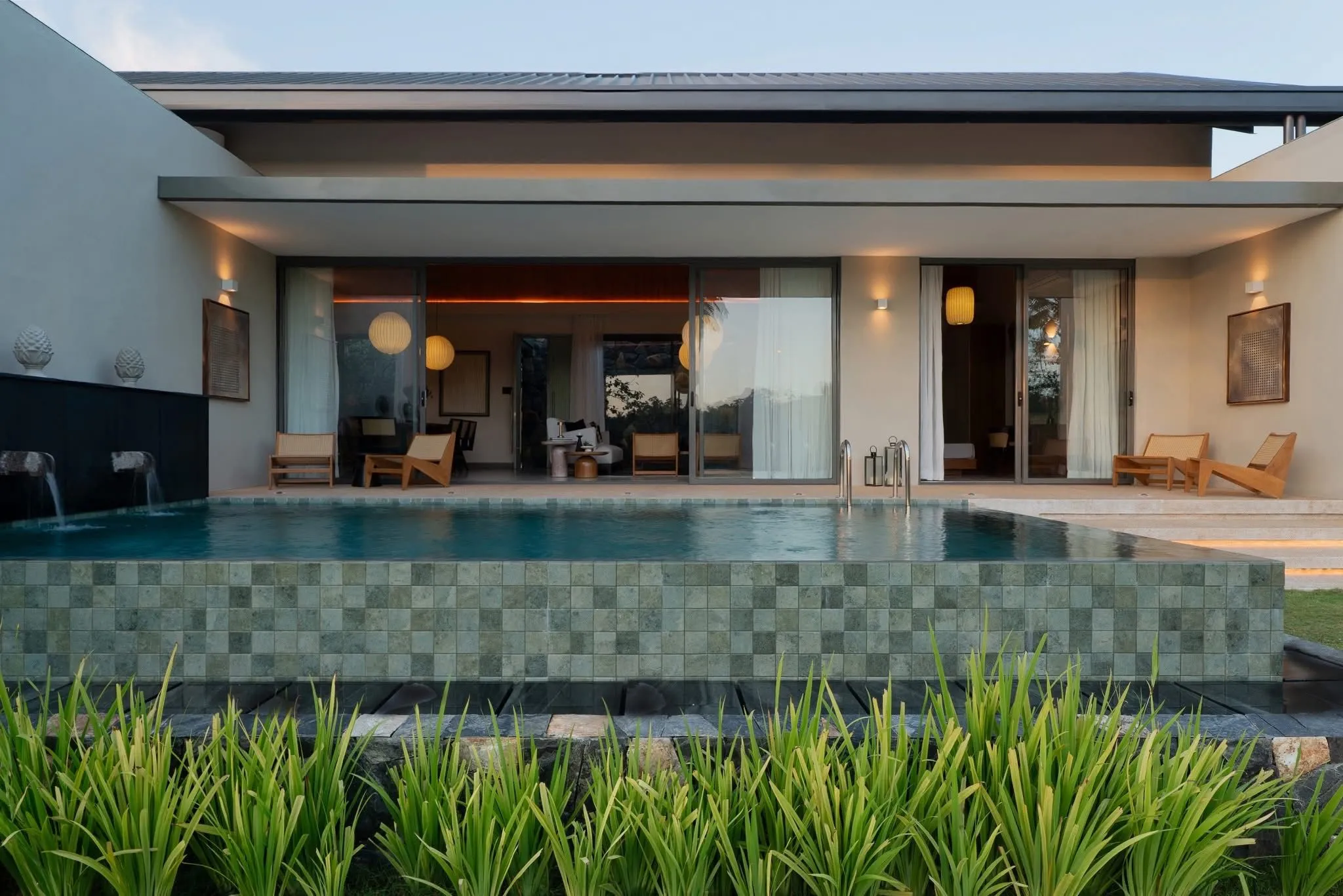 Pool facade at Hansa Villa in the evening