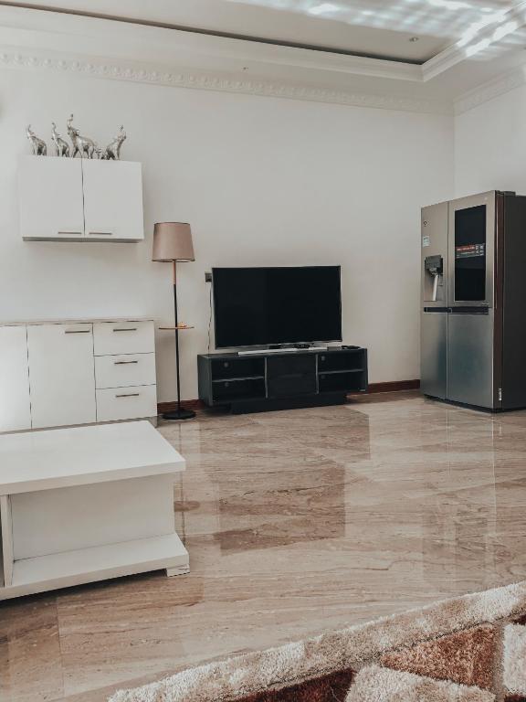 Apartment living room and kitchen at Pinnacle Boutique Villas