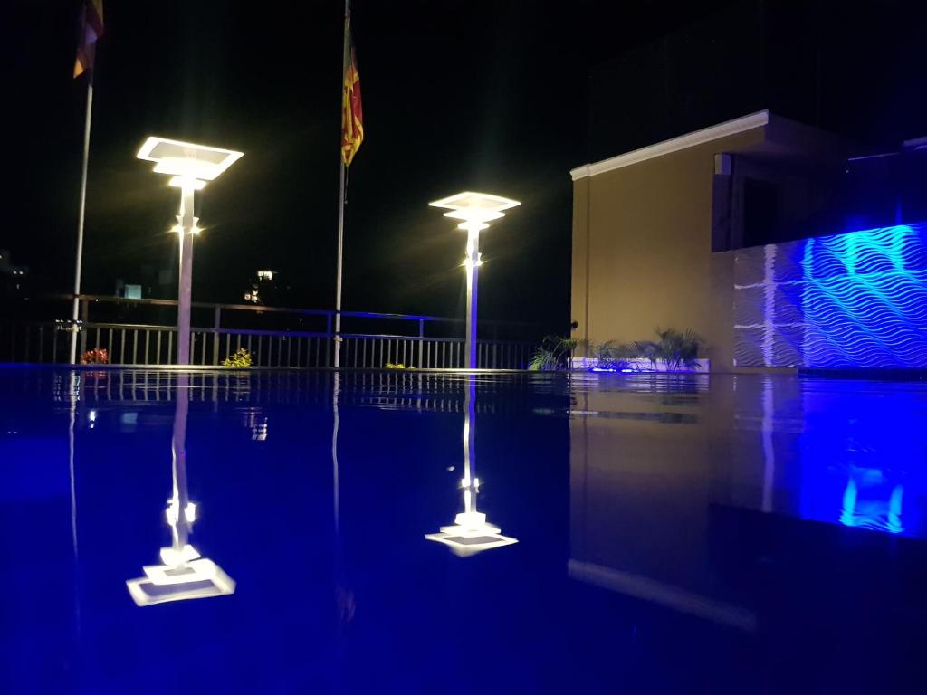 Rooftop pool lit up at night