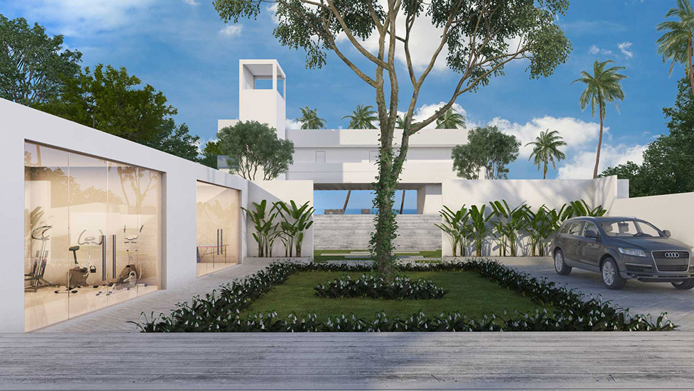 Villa entrance and driveway with the glass-walled gym beside it