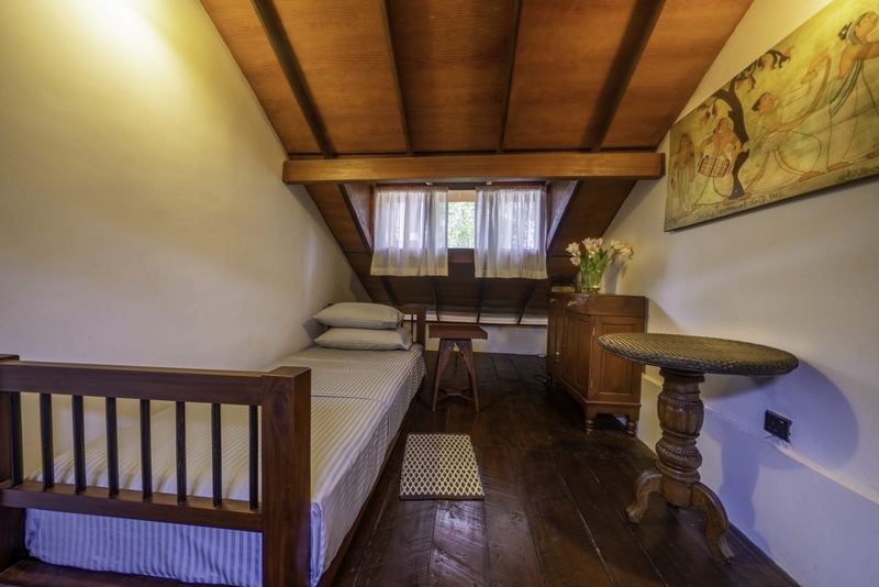 Attic room under the timber roof