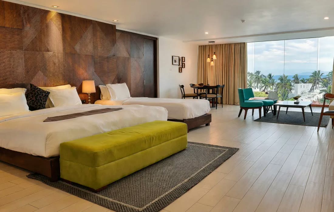 Suite Salt, the family suite at Triple O Six, with wide ocean-view windows