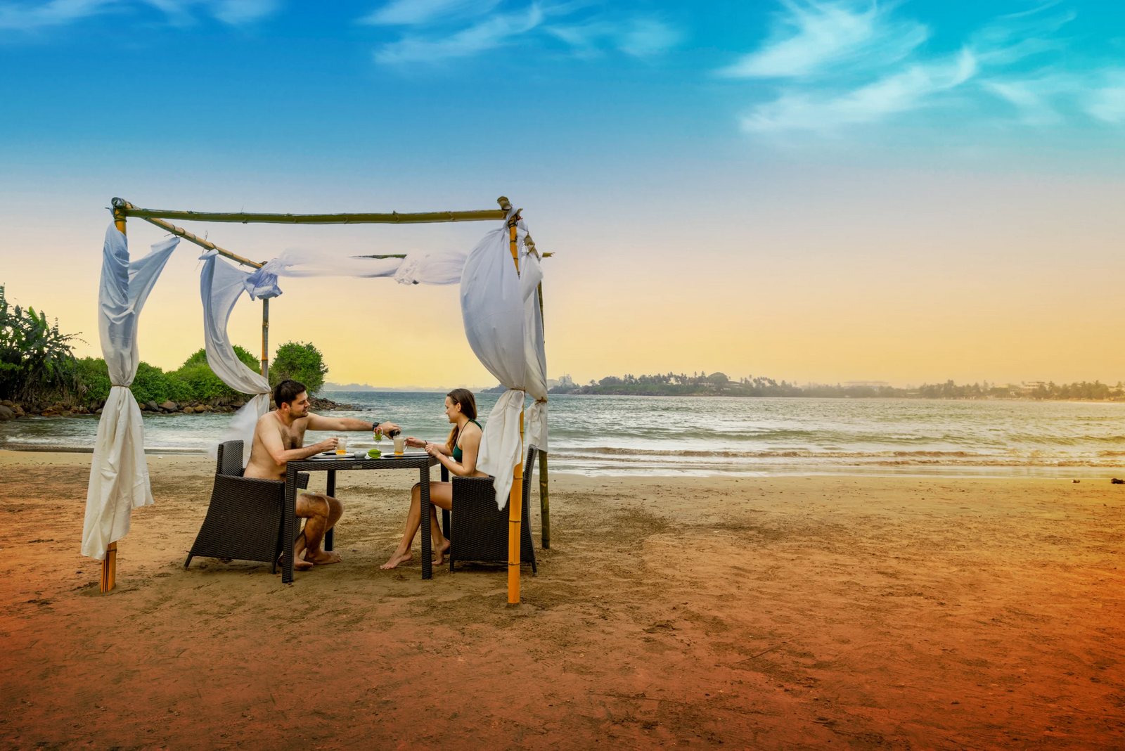 Beach dinner canopy at sunset