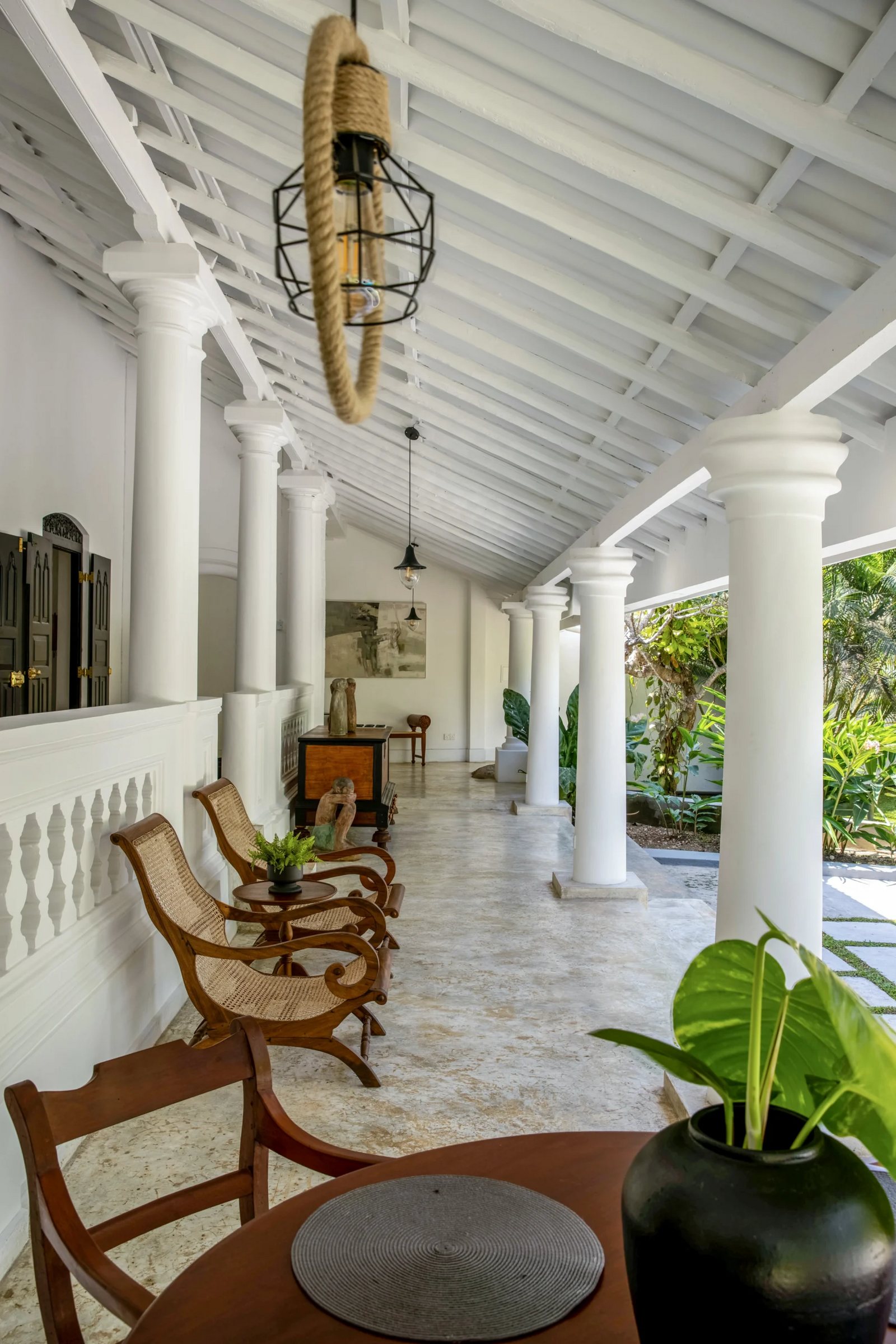 Veranda with chairs overlooking the garden