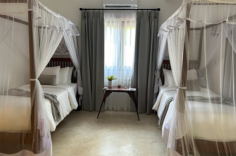 Bedroom Four — Twin Room / Studio Family Room with two single beds